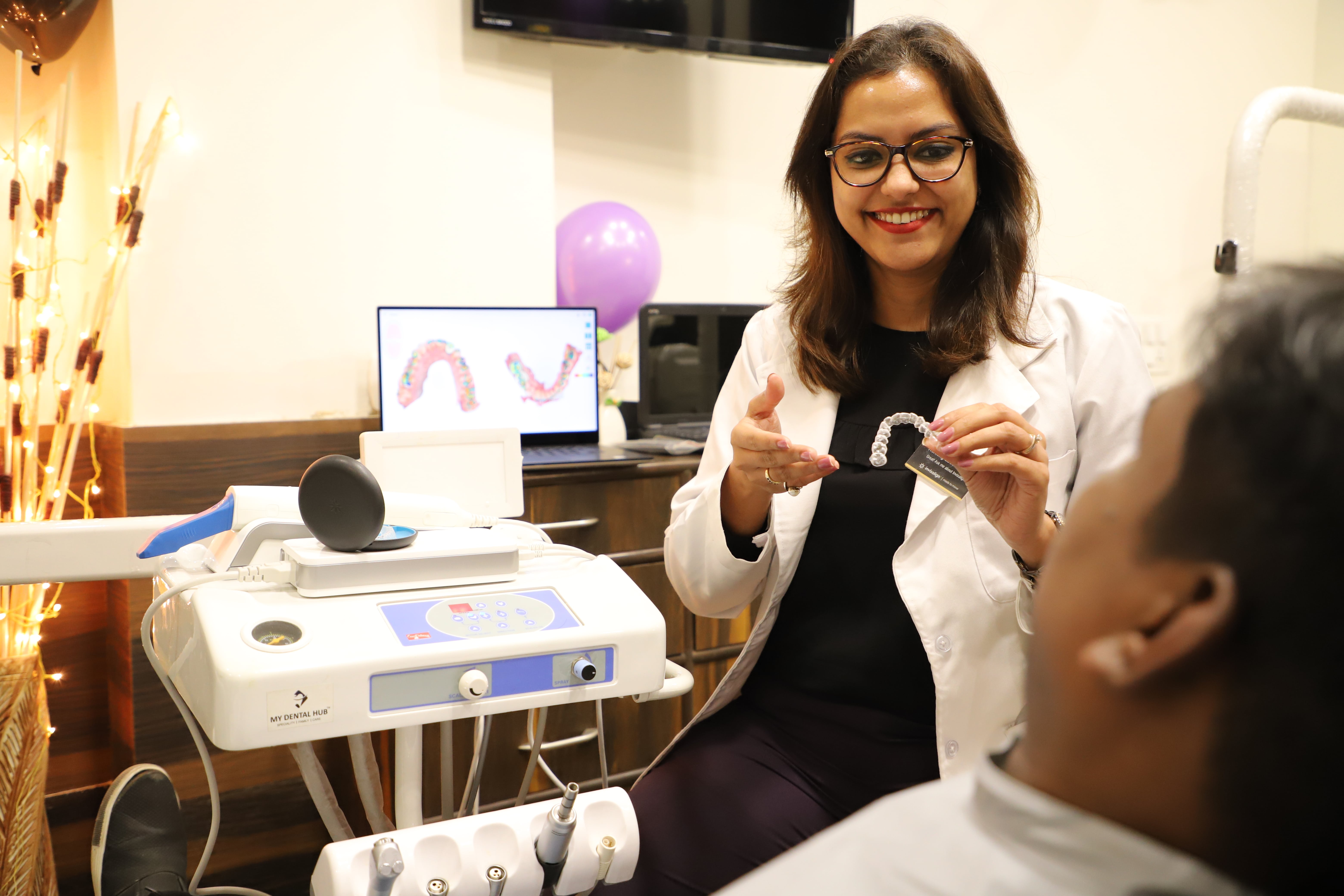Doctor explaining aligners to patient
